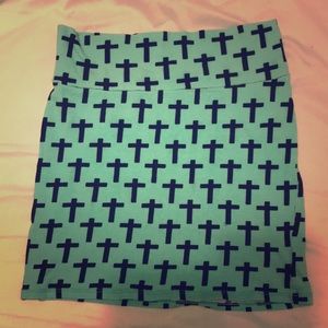 A teal skirt, XS, that can also be used as a top.
